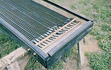 SolaRoll has rubber framing strips to cover the wood.